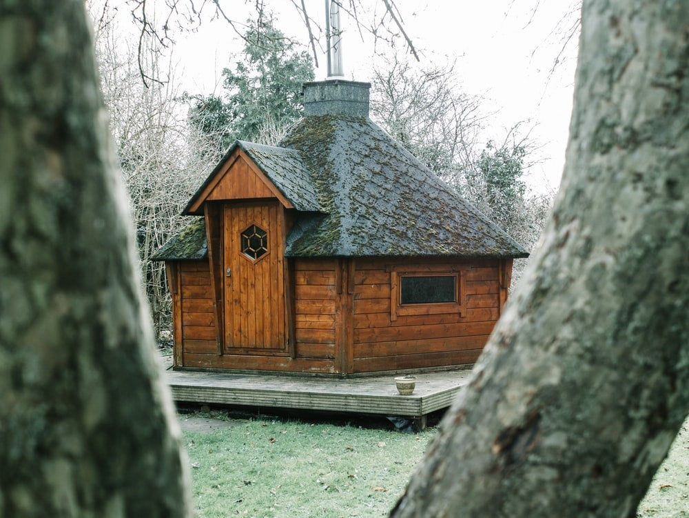 A Health Mate sauna installed outside a house.